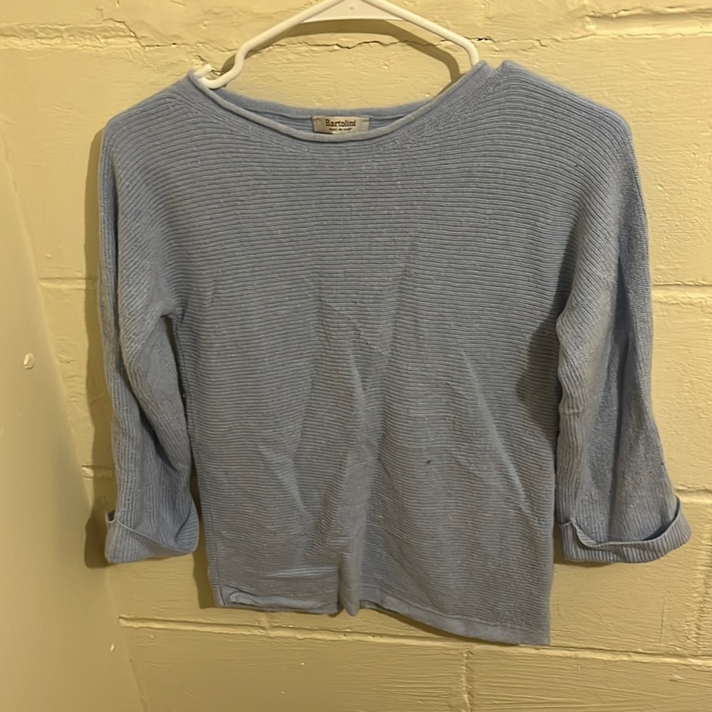 light blue sweater
